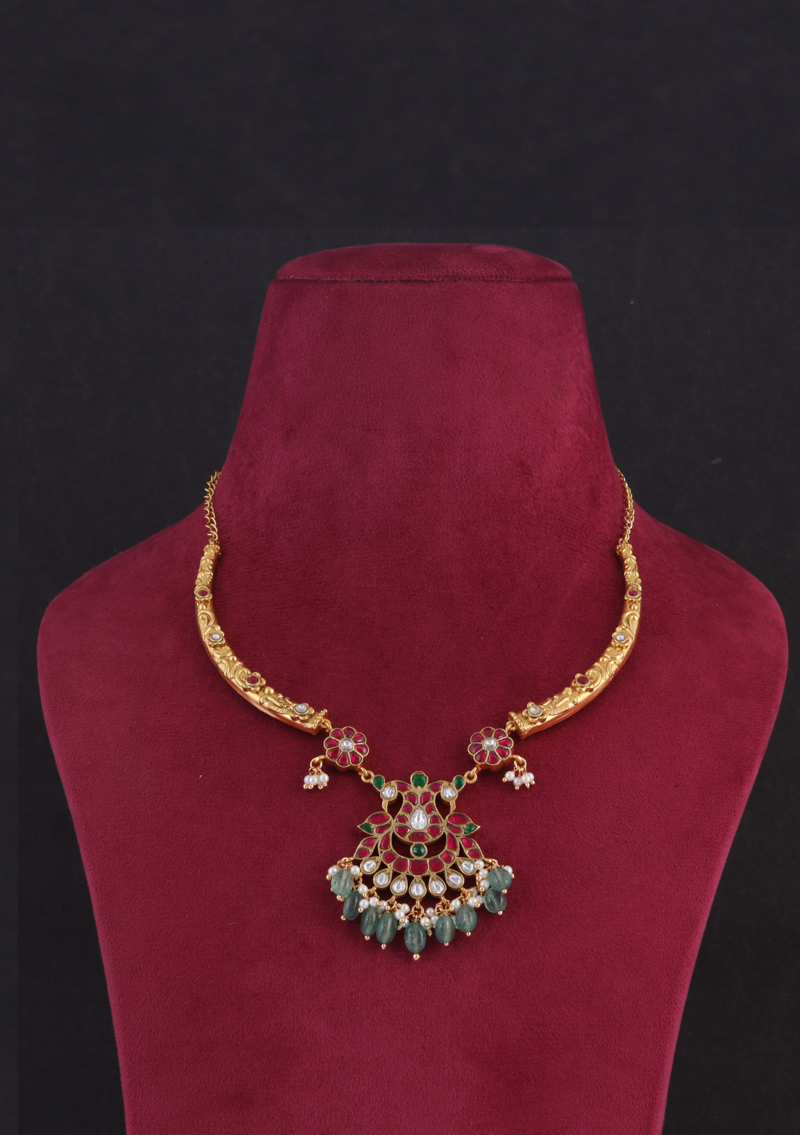 Opulent Designer Jadau Kundan Hasli Necklace with Green Emerald Hangings