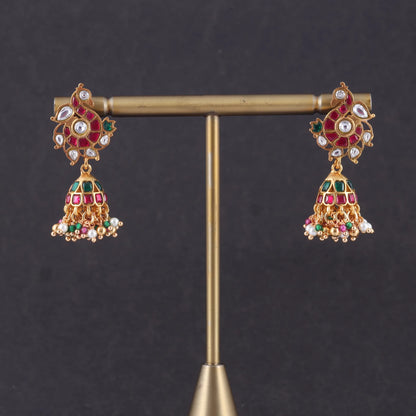 Stylish Peacock Motif Jadau Kundan Jhumka Earrings with Pearl and Green Beads Hangings