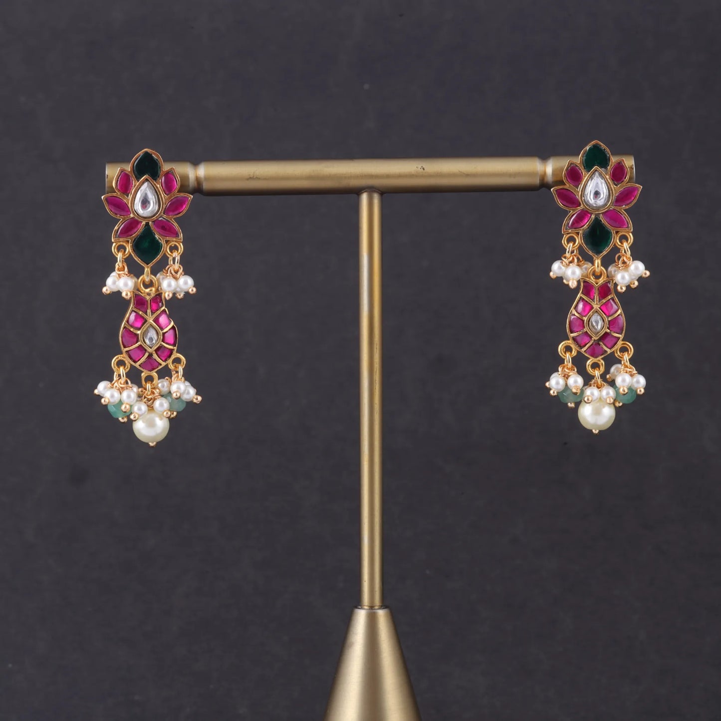 Dazzling Jadau Kundan Designer Earrings with Pear and Green Beads Hangings