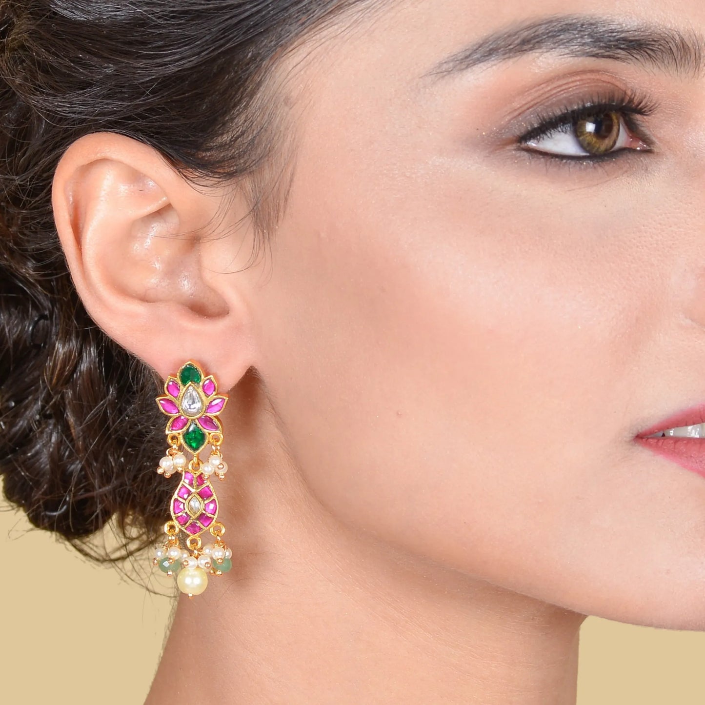 Dazzling Jadau Kundan Designer Earrings with Pear and Green Beads Hangings