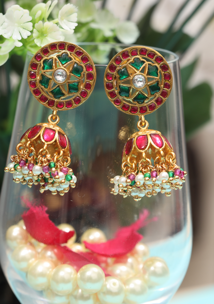 Classic Floral Pattern Jadau Kundan Jhumka Earrings with Pearl, Red and Green Beads Hangings