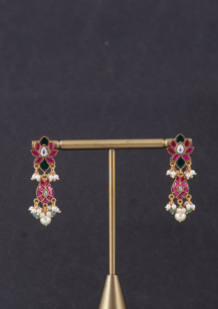 Dazzling Jadau Kundan Designer Earrings with Pear and Green Beads Hangings