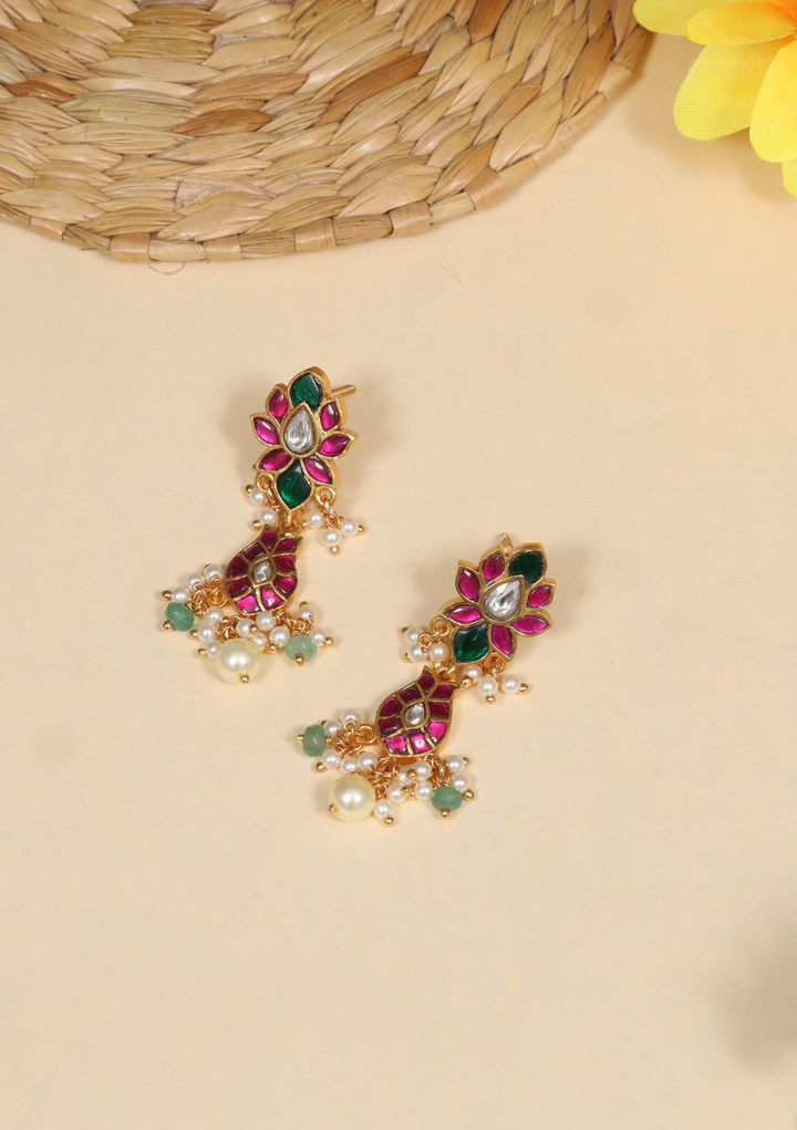 Dazzling Jadau Kundan Designer Earrings with Pear and Green Beads Hangings