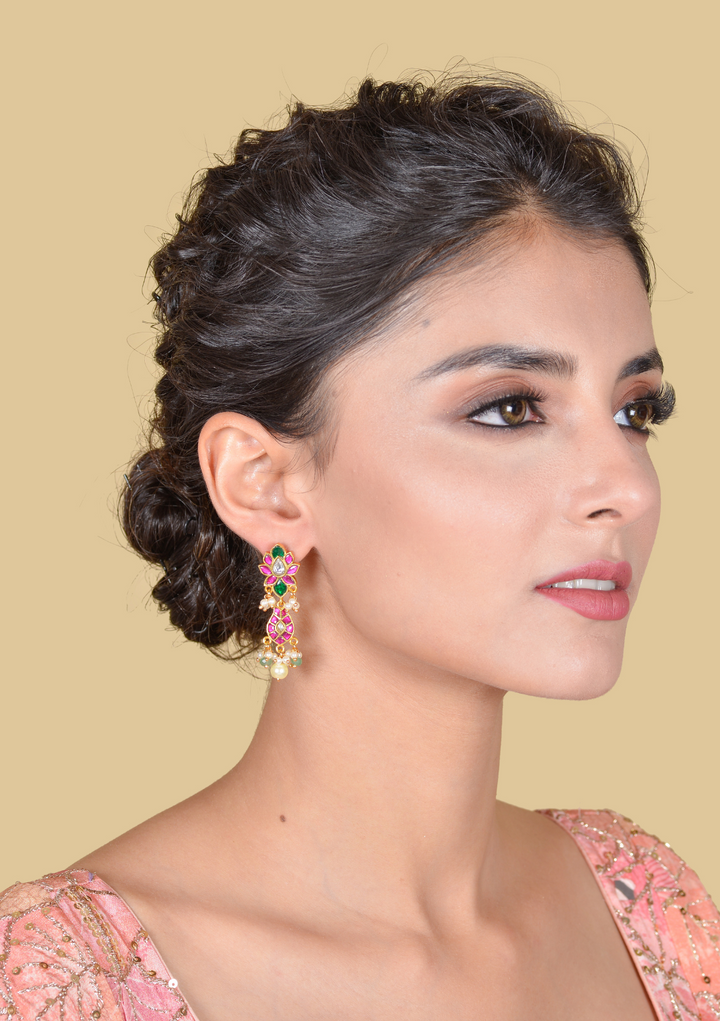 Dazzling Jadau Kundan Designer Earrings with Pear and Green Beads Hangings