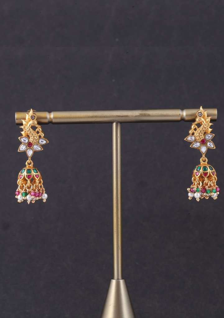 Pretty Looking Peacock Jadau Kundan Jhumka Earrings with Peal, Red and Green Beads Hangings