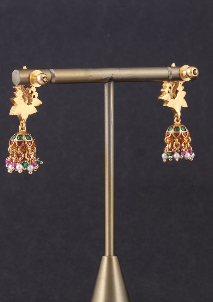 Pretty Looking Peacock Jadau Kundan Jhumka Earrings with Peal, Red and Green Beads Hangings