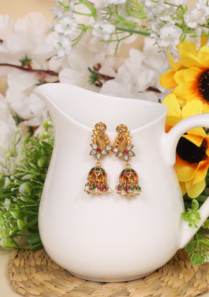 Pretty Looking Peacock Jadau Kundan Jhumka Earrings with Peal, Red and Green Beads Hangings