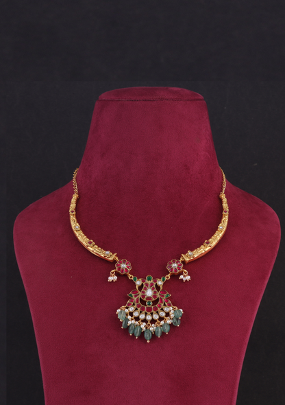 Opulent Designer Jadau Kundan Hasli Necklace with Green Emerald Hangings