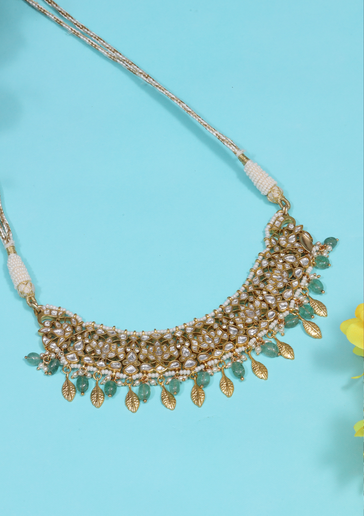 Anuradha White Jadau Kundan Necklace with Emerald Beads Hangings