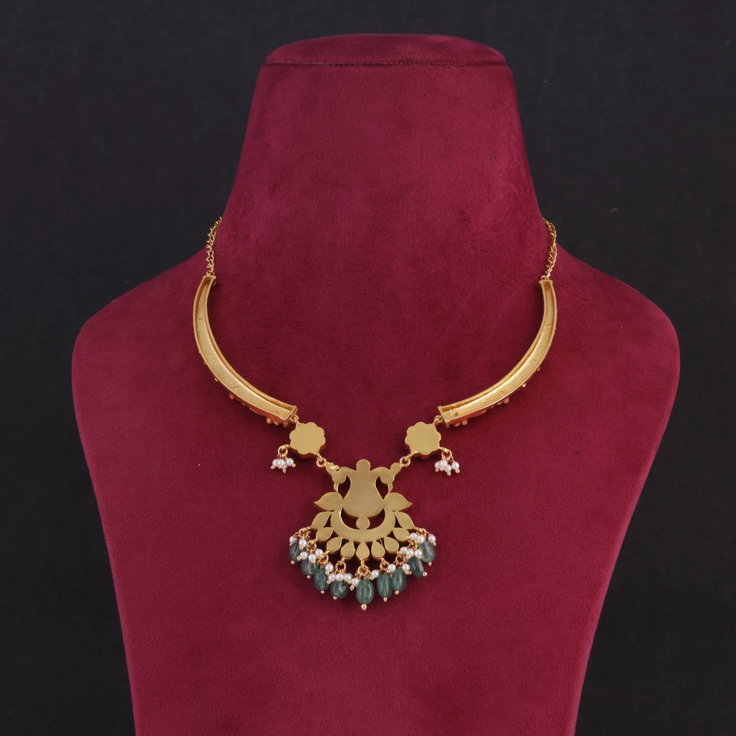 Opulent Designer Jadau Kundan Hasli Necklace with Green Emerald Hangings